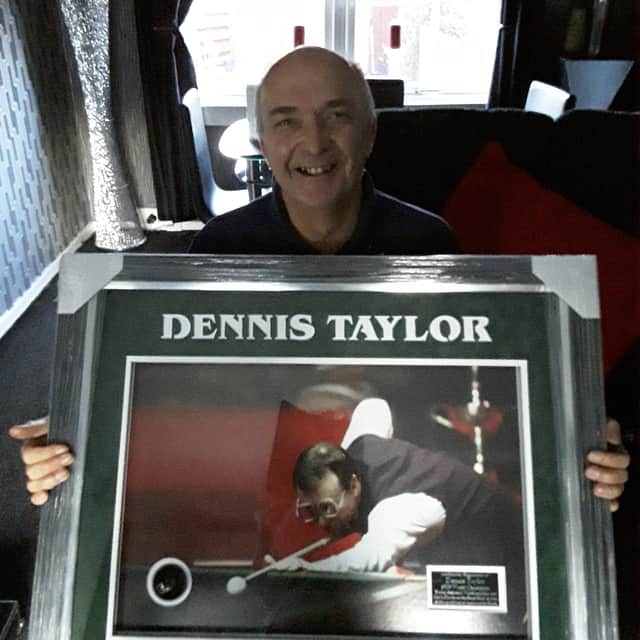 Stan with the Dennis Taylor picture he's hoping will help the local NHS