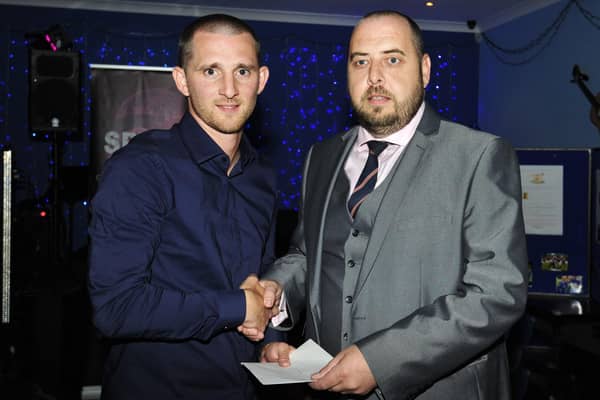 BU chairman Iain Muirhead (right), pictured with player Will Snowdon, hopes to ffind out within a fortnight if the club have gained a licence and been promoted to the Lowland League.