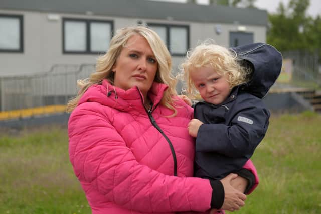 Jodie Barron is angry about changes to nursery plans and way it was communicated. She is pictured with her son Fallon (3).    Pic: Michael Gillen