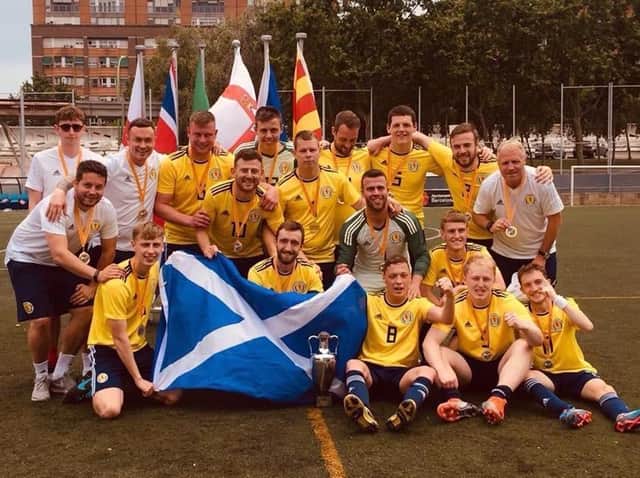 Greig (1st left) with Scotland cerebral palsy team squad after winning their first ever tournament in Barcelona last year without conceding a goal.