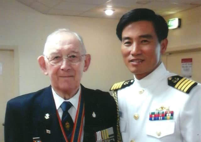 Peter MacKenzie with the South Korean Naval Defence Attache