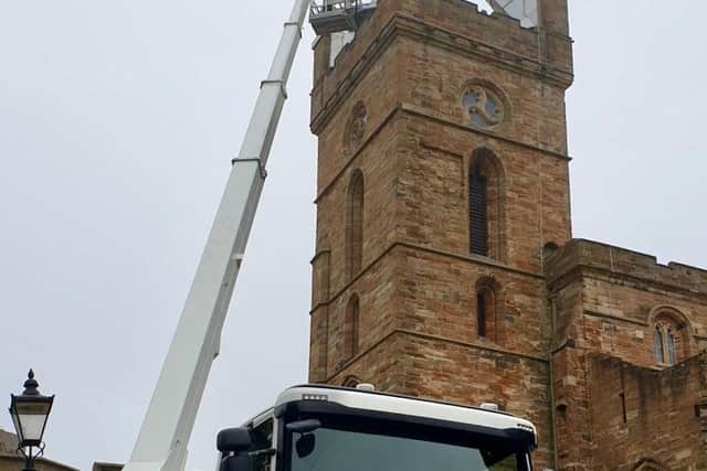 Engineers at work earlier this week on the spire at St Michael's Parish in Linlithgow.