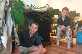 Den building is part of the family day fun for Cubs and Scouts.