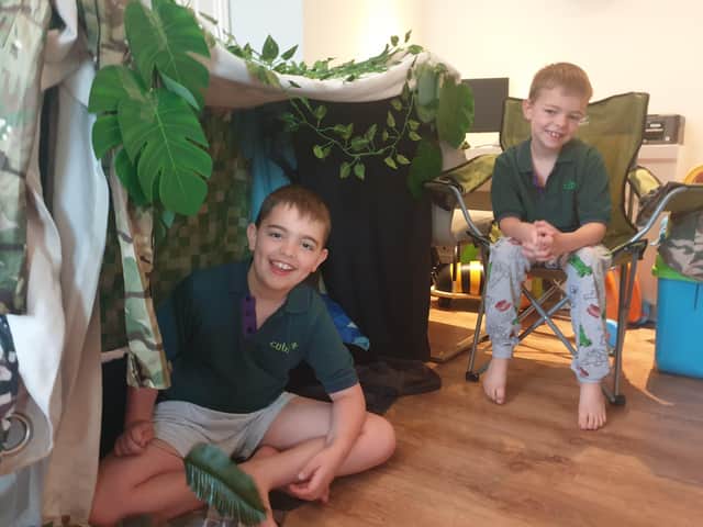 Den building is part of the family day fun for Cubs and Scouts.