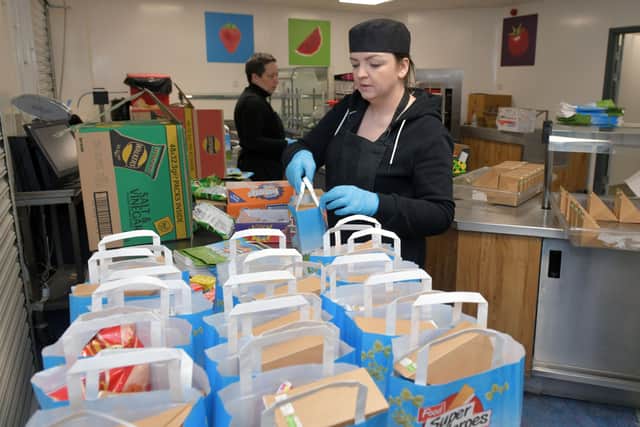 Grab and go food bags made up for school children during the Easter holidays in kitchens at Larbert High School