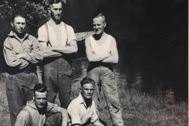 Jack Low was a strapping ploughman when he was pictured here (back, centre) not long after arriving in France.