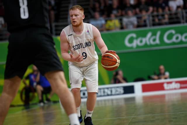 Scotland's Jonathan Bunyan (R) competes in men's bronze medal basketball match against New Zealand at the 2018 Gold Coast Commonwealth Games at the Gold Coast Convention and Exhibition Centre venue on the Gold Coast on April 15, 2018.  (YE AUNG THU/AFP via Getty Images)
