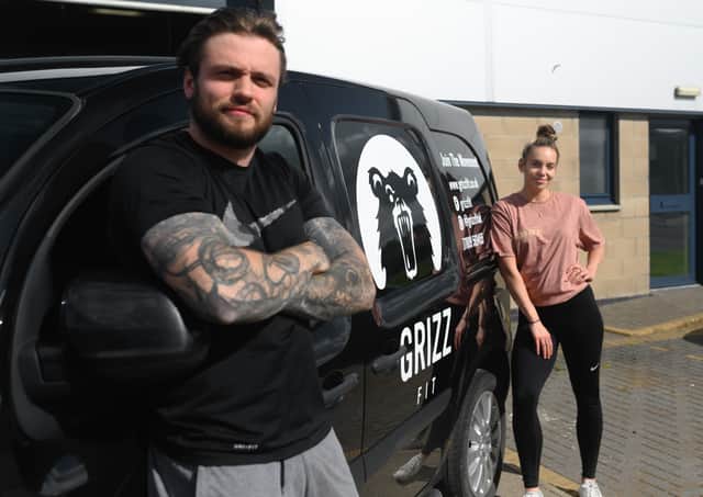 GrizzFit ownersTom Griscti and Jenny Matthews.