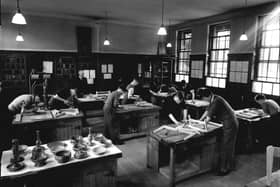 Boys working in the woodwork class.