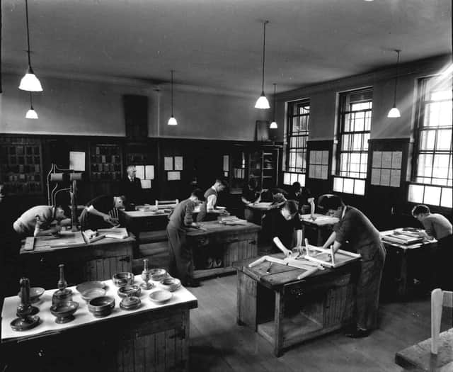 Boys working in the woodwork class.