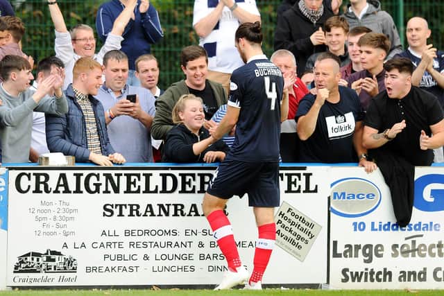 Captain Gregor Buchanan with Falkirk fans at the end of the game.  Picture: Michael Gillen.