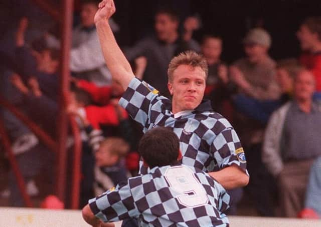 David Hagen celebrates Falkirk scoring at Brockville.