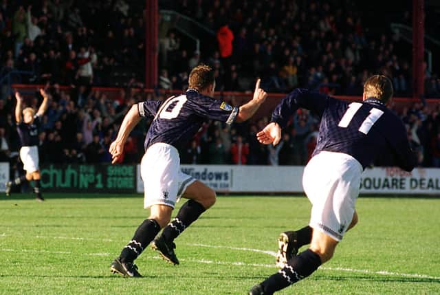 David Moss and David Hagen celebrate a Falkirk goal against Dundee.