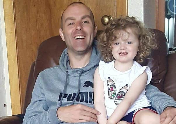 Andy Aitken, with his three year old daughter Harper who tragically passed away last year from Sepsis.