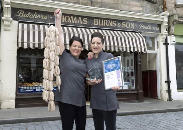 Jane Ross (left) and her sister Emma Burns of Thomas Burns & Son Butchers in Bo’ness with their award. Photo by Graeme Hart.