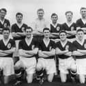 The Scotland football team set to take part in the World Cup in Sweden, 13th May 1958. From left to right, (back row) John Davidson Hewie, Eric Caldow, Thomas Younger, Edward Hunter Turnbull, Robert Evans and Douglas Cowie; (front row) Graham Leggat, James Murray, John Knight Mudie, Robert Young Collins and James John Stewart Imlach.  (Photo by Keystone/Hulton Archive/Getty Images)