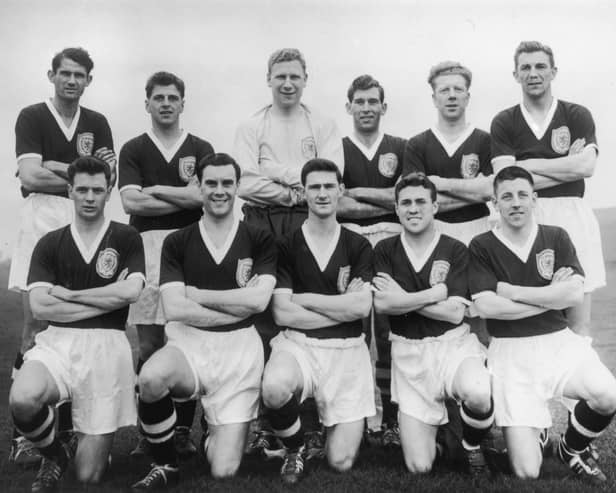 The Scotland football team set to take part in the World Cup in Sweden, 13th May 1958. From left to right, (back row) John Davidson Hewie, Eric Caldow, Thomas Younger, Edward Hunter Turnbull, Robert Evans and Douglas Cowie; (front row) Graham Leggat, James Murray, John Knight Mudie, Robert Young Collins and James John Stewart Imlach.  (Photo by Keystone/Hulton Archive/Getty Images)