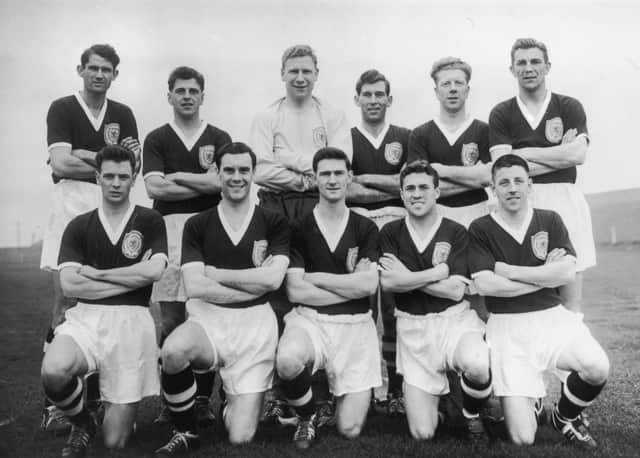 The Scotland football team set to take part in the World Cup in Sweden, 13th May 1958. From left to right, (back row) John Davidson Hewie, Eric Caldow, Thomas Younger, Edward Hunter Turnbull, Robert Evans and Douglas Cowie; (front row) Graham Leggat, James Murray, John Knight Mudie, Robert Young Collins and James John Stewart Imlach.  (Photo by Keystone/Hulton Archive/Getty Images)