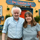 Colm and Sheena O'Rourke asked villagers to take part in the vote.  Pic: Michael Gillen.