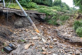 The main Edinburgh to Glasgow train line was damaged near Polmont on Wednesday, August 12, 2020 after the Union Canal breached its banks.