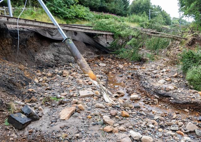 The main Edinburgh to Glasgow train line was damaged near Polmont on Wednesday, August 12, 2020 after the Union Canal breached its banks.