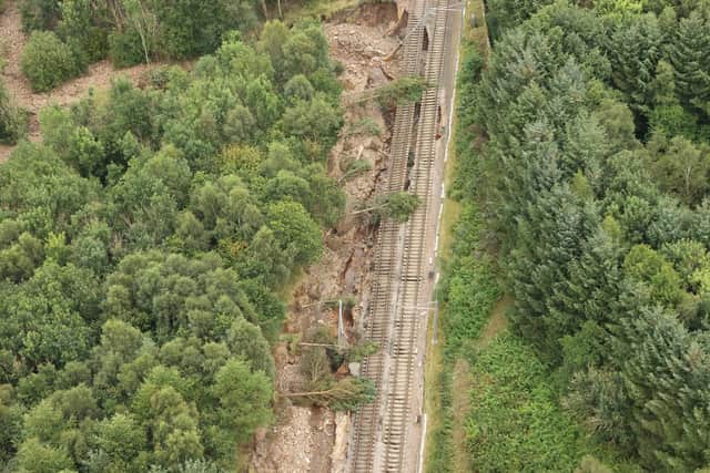 The main Edinburgh to Glasgow train line was damaged near Polmont on Wednesday, August 12, 2020 after the Union Canal breached its banks.