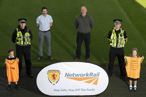Training sessions...not only to learn silky skills but key rail safety messages. Pictured at the launch event at Easter Road are (l-r) Alfie Hocknull, Stuart Livingstone, Paul McNeil, Mark Henderson, Bryan O'Neill and Zoe Hocknull 

(Pic: Paul Devlin)