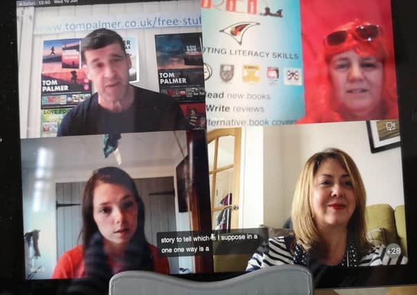 Bo'ness Academy's Jacqui McIntyre (in the red wig) leads the Virtual Question and Answer Session on Microsoft Teams with author, Tom Palmer,  who was delighted to hear that RED stands for Read, Enjoy Debate!