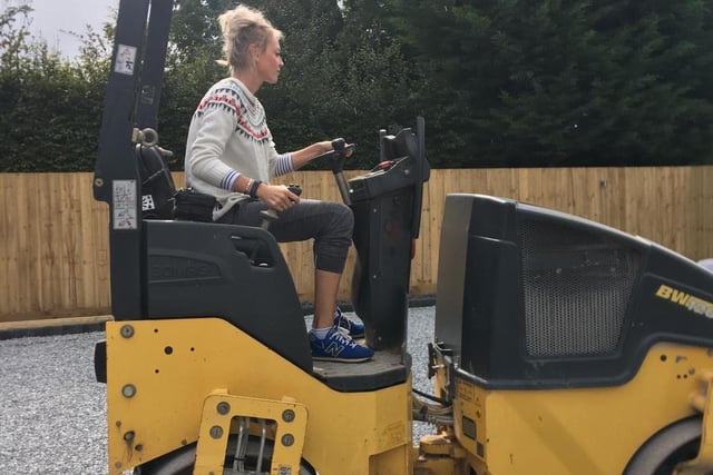 Ela helping with the build at the site in Orby.