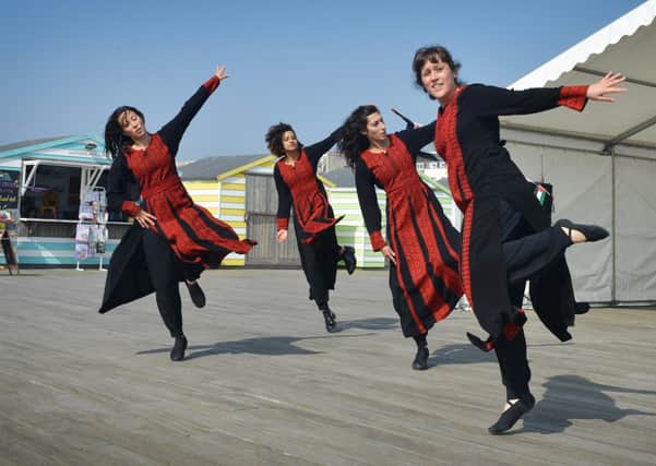 Palestine on the Pier in Hastings.Hawiyya Dance Company. SUS-210509-135730001
