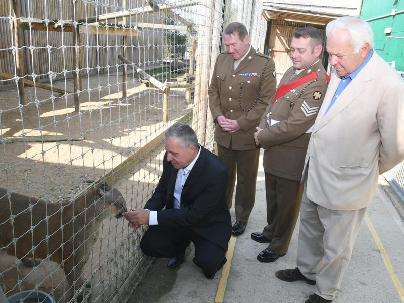 Steve Nichols, the Chief Executive of Lincolnshire Wildlife Park, gets up close with Nigel the Puma, watched by Major Mitch Pegg, Officer Commanding of the 3rd Battalion The Royal Anglian Regiment.Sgt Stephen Grant, and the Lord Lieutenant of Lincolnshire, Mr Toby Dennis.
