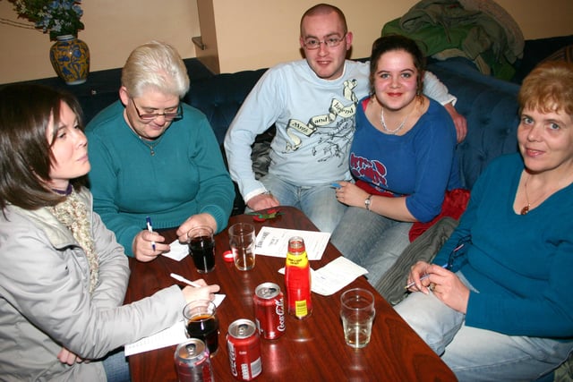 Putting on the thinking caps at Balanamore FC table quiz held at Ballymoney United Social Centre.BM46-026JC