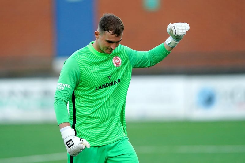Larne goalkeeper Rohan Ferguson gestures to the fans at the end