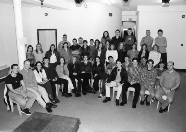 Brian McGuigan (far right) and some of the staff and members of Reach Across at a reception in the Nucleus prior to their first anniversary in August 1996.