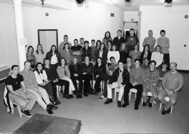 Brian McGuigan (far right) and some of the staff and members of Reach Across at a reception in the Nucleus prior to their first anniversary in August 1996.