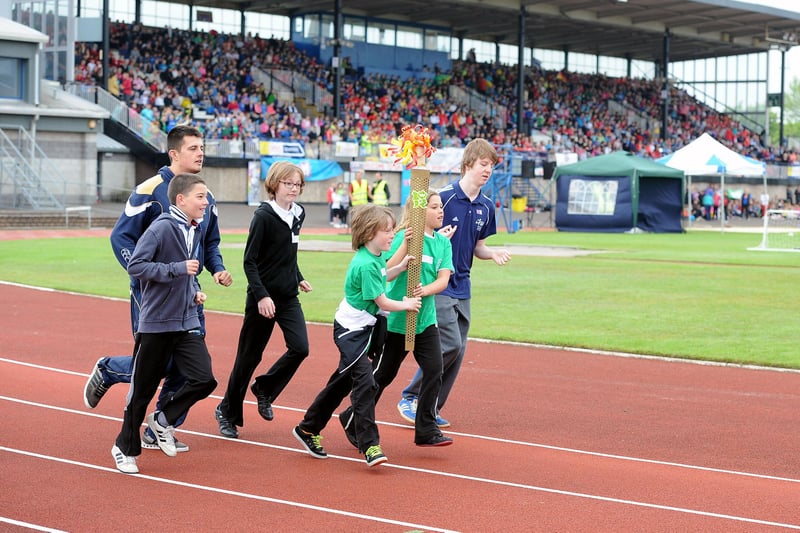 The 'Olympic torch' was carried around the stadium during the opening ceremony.