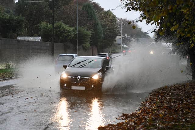 Heavy rain leads to flash floods on Westburn Avenue, Falkirk