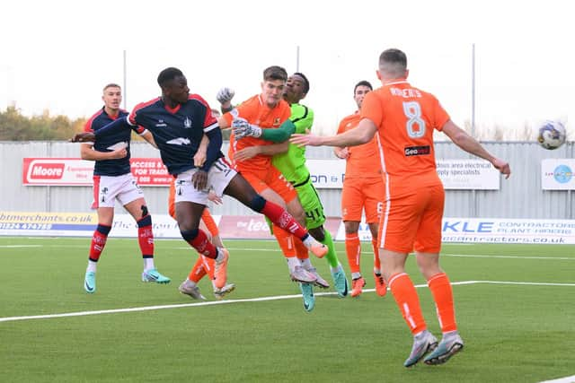 Agyeman heads home the opener for Falkirk against Alloa (Photo: Ian Sneddon)