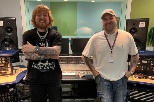 Craig Eddie, winner of The Voice UK, with lecturer Barry Frame at Forth Valley College's sound production studios.