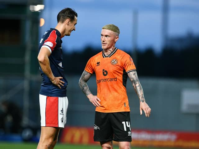 Liam Henderson and ex-Falkirk star Craig Sibbald at the end of the Viaplay Cup tie earlier this campaign - which saw Dundee United prevail 1-0 (Photo: Michael Gillen)