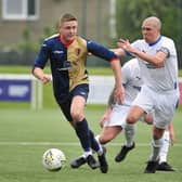 Captain Michael Gemmell looks to chase down possession in midfield (Pictures: Alan Murray)