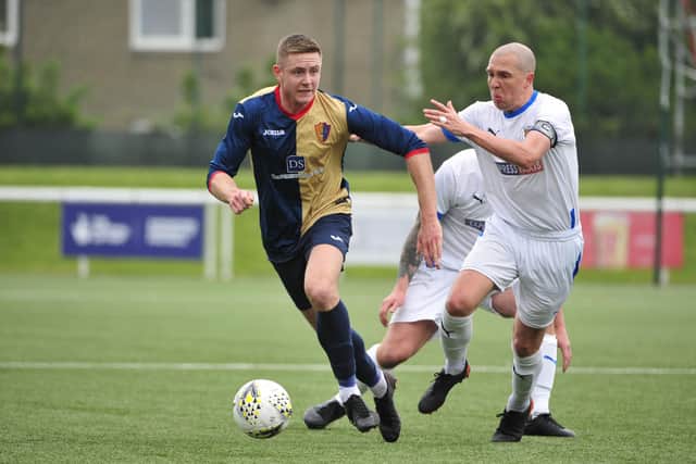 Captain Michael Gemmell looks to chase down possession in midfield (Pictures: Alan Murray)