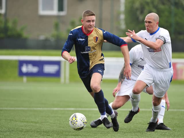 Captain Michael Gemmell looks to chase down possession in midfield (Pictures: Alan Murray)