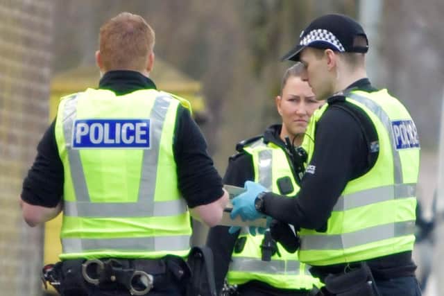 Two men have charged three men in connection with fraud-related incidents in Stirling and Aberdeen. Picture: Michael Gillen.