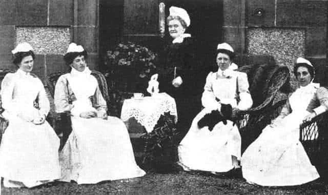 Miss Joss with some of her staff in 1889.