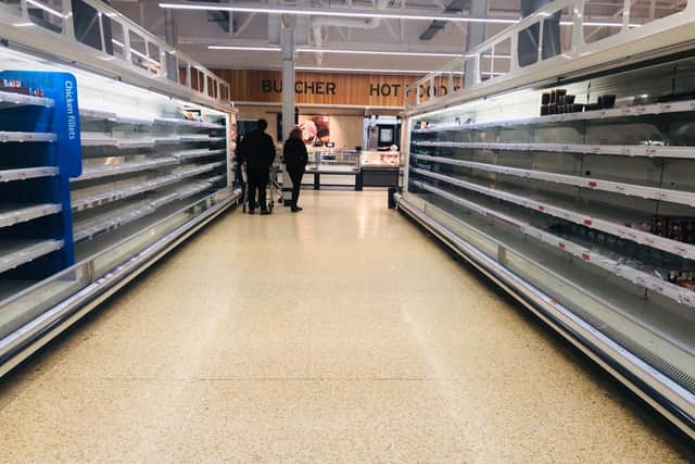 Panic buyers have stripped supermarket shelves of food, soap and toilet rolls as fears rise over the spread of coronavirus