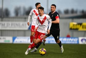 Former Bairns player Charlie Telfer tussles with Stephen McGinn (Pics by Michael Gillen)