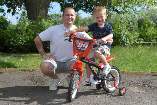 Harry Wright with joins Gavin as he limbers up for his last 5k cycle ride to raise funds for the NHS