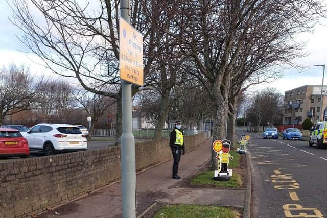 Police officers - big and small -  were out in force outside Bowhouse Primary School
