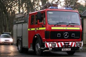 Firefighters have called for immediate talks with the Scottish Government over proposals to cut the bottom off doors in schools.